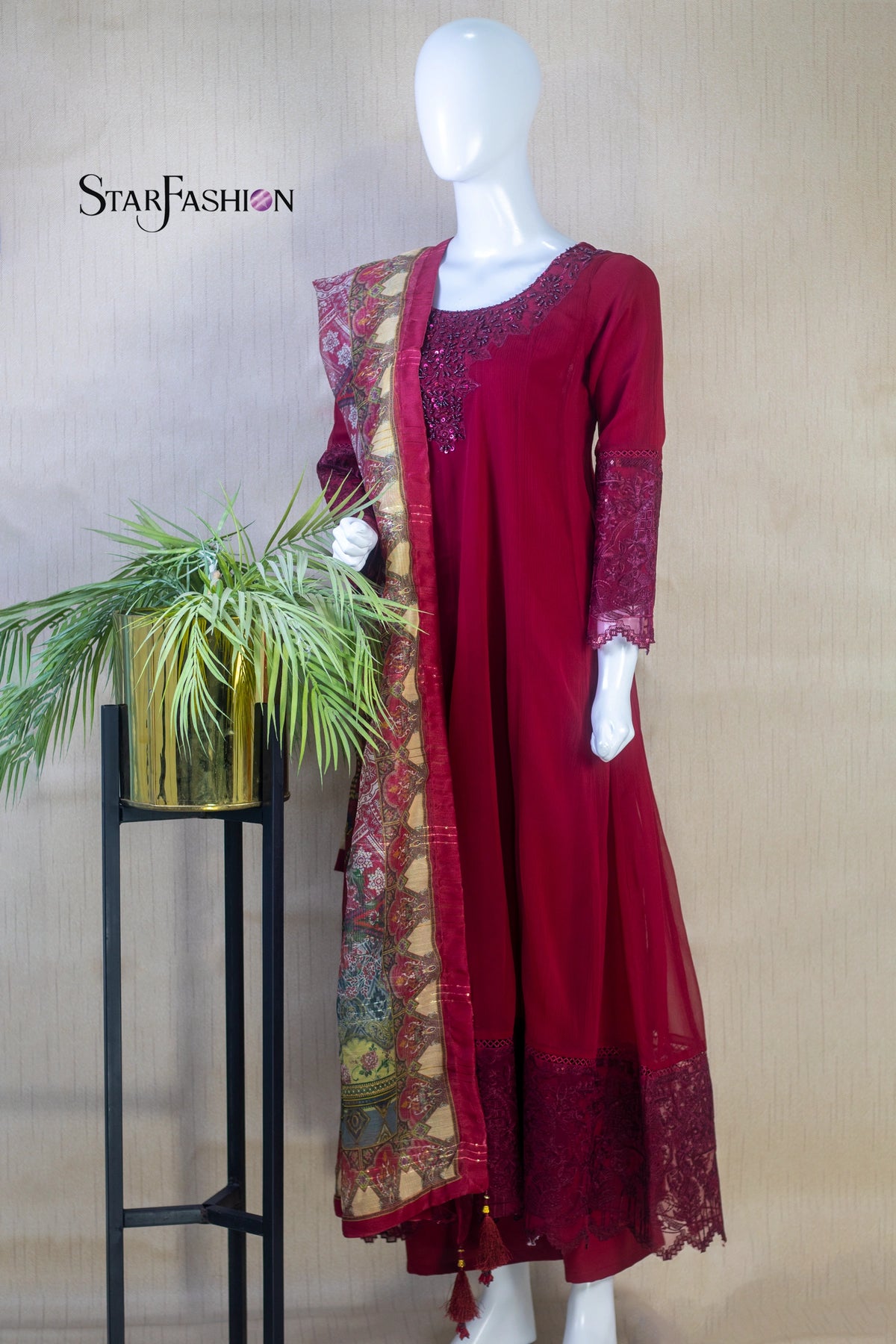 Command attention with Star Fashion’s embroidered Maroon A‑line chiffon kurta ensemble, a 3‑piece stitched suit that blends timeless elegance with modern sophistication.