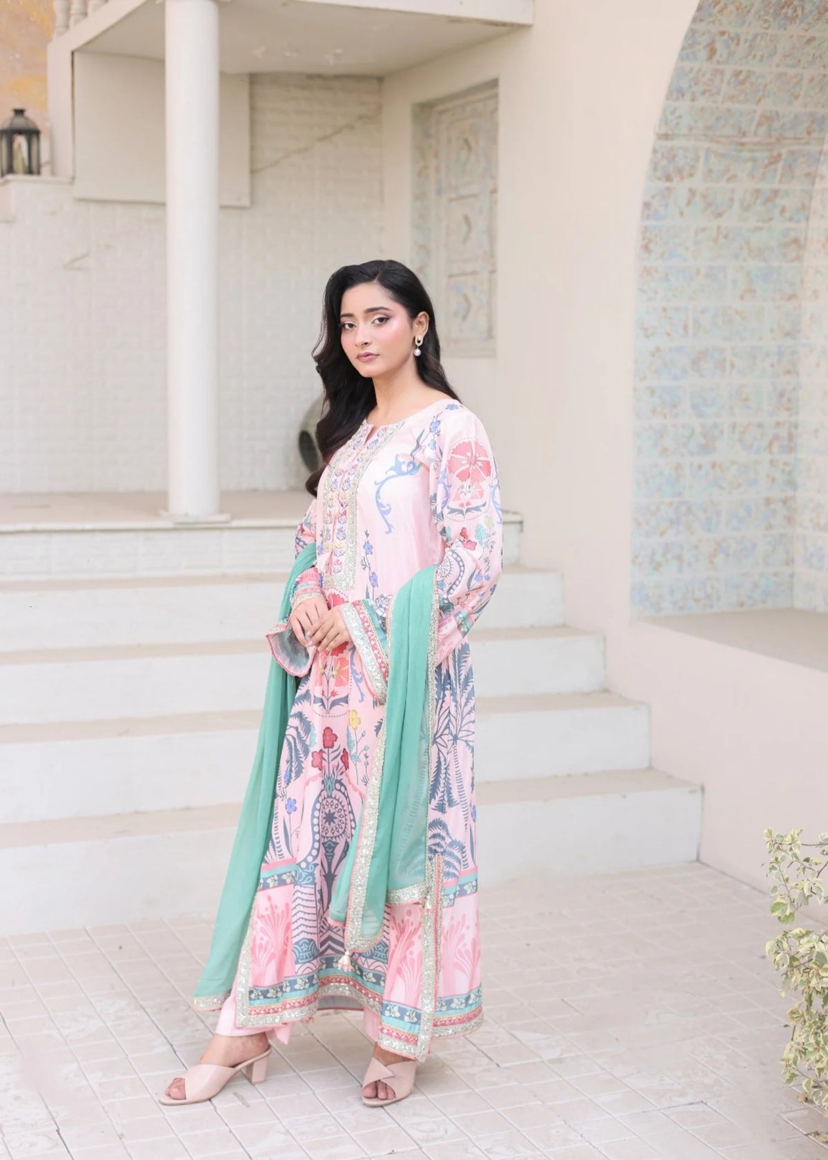 Step into effortless sophistication with this Pink Digital Print 3-Piece Stitched Suit, crafted from premium Bana Dora fabric for exceptional comfort and style. Featuring a beautifully designed digital print shirt, matching straight pants, and an airy chiffon dupatta, this ensemble brings together modern fashion and everyday wearability.
The relaxed fit ensures all-day comfort, while the vibrant pink hue adds a fresh and feminine touch, making it an ideal choice for casual outings, family gatherings, brunc