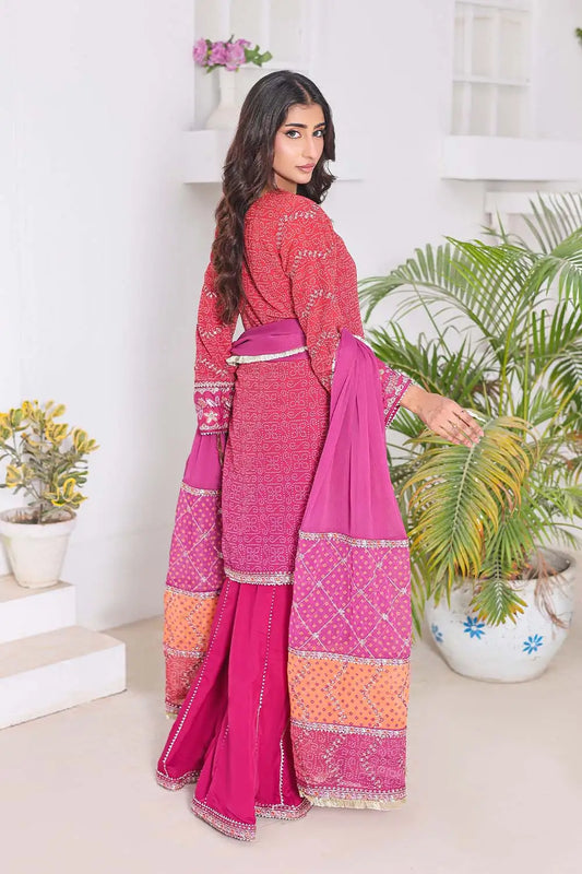 Shocking Pink three-piece women's suit featuring a Bandhani Chunri print short chiffon kurti with keyhole neckline, wide-flared crepe palazzo trousers, and chiffon dupatta with patchwork pallu.