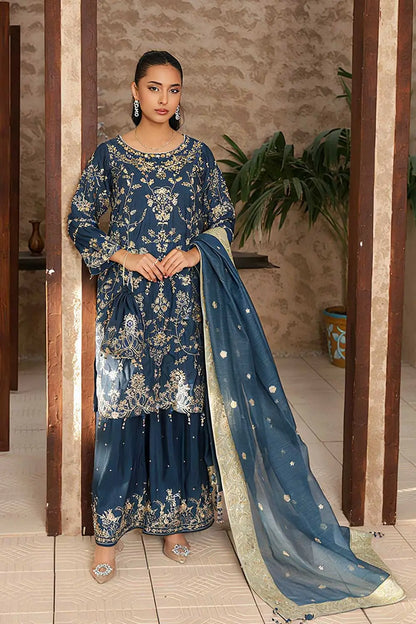 Embrace timeless sophistication with Star Fashion’s navy blue embroidered kurta set, a 3‑piece stitched ensemble designed for festive elegance.
Design Highlights:
Kurta: Straight‑cut silhouette in premium raw silk, adorned with intricate embroidery.
Gharara: Flowing raw silk gharara that adds traditional charm and graceful movement.
Dupatta: Khaddi net dupatta with delicate embroidered accents, completing the regal look.
Perfect for weddings, festive soirées, and cultural gatherings, this outfit