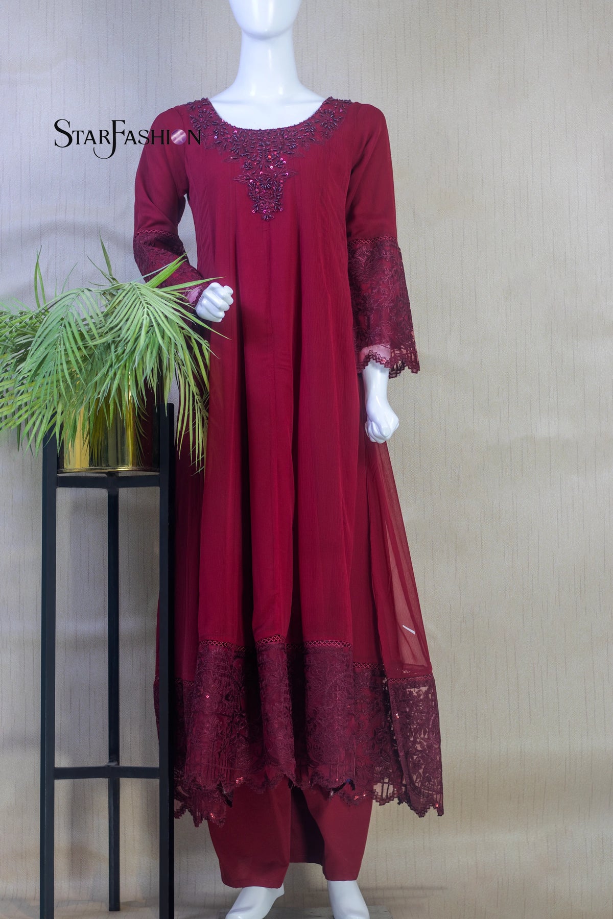 Command attention with Star Fashion’s embroidered Maroon A‑line chiffon kurta ensemble, a 3‑piece stitched suit that blends timeless elegance with modern sophistication.