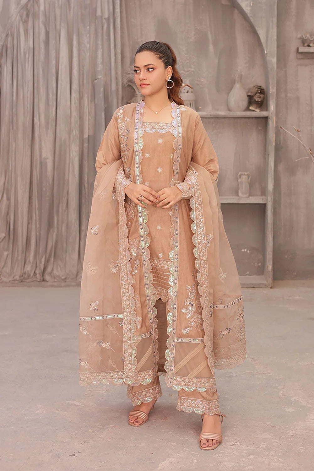 "Designer coral pink embroidered 4‑piece stitched suit with organza dupatta – festive wear"
