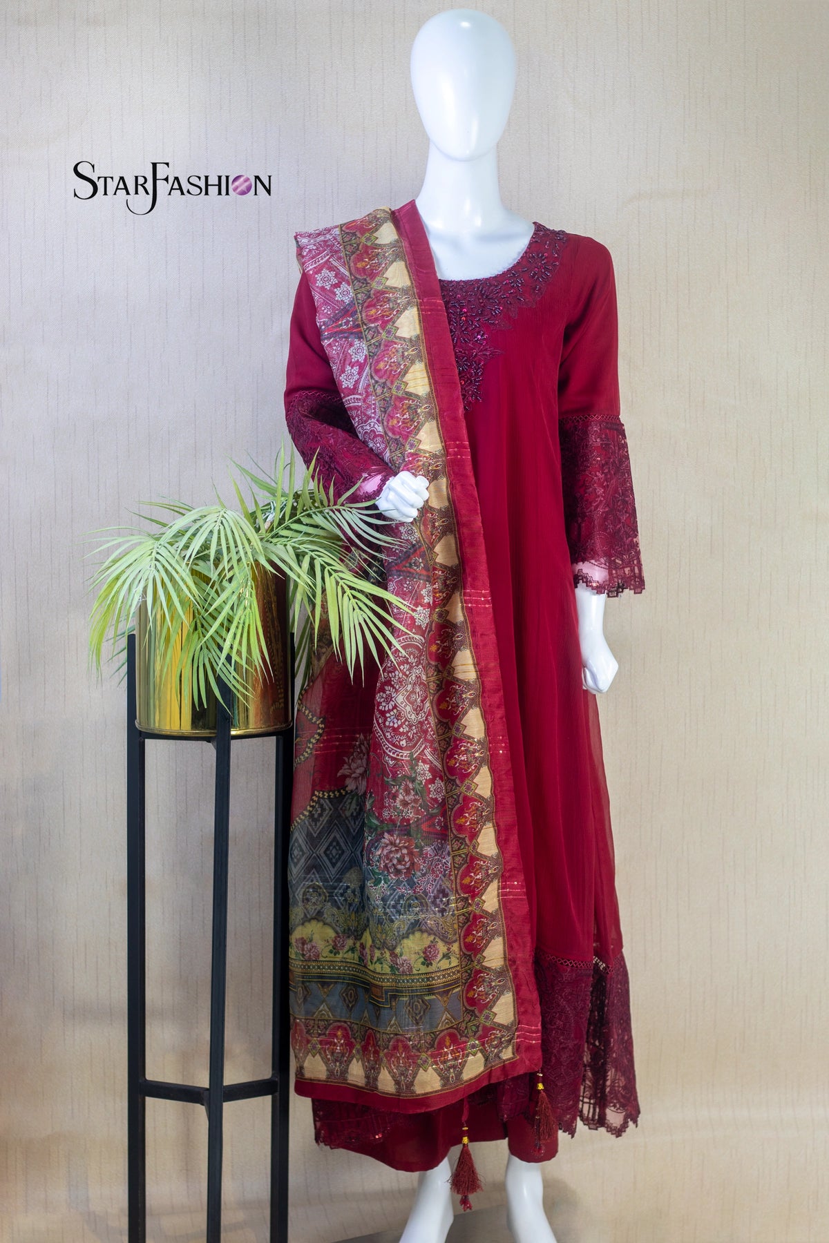 Command attention with Star Fashion’s embroidered Maroon A‑line chiffon kurta ensemble, a 3‑piece stitched suit that blends timeless elegance with modern sophistication.