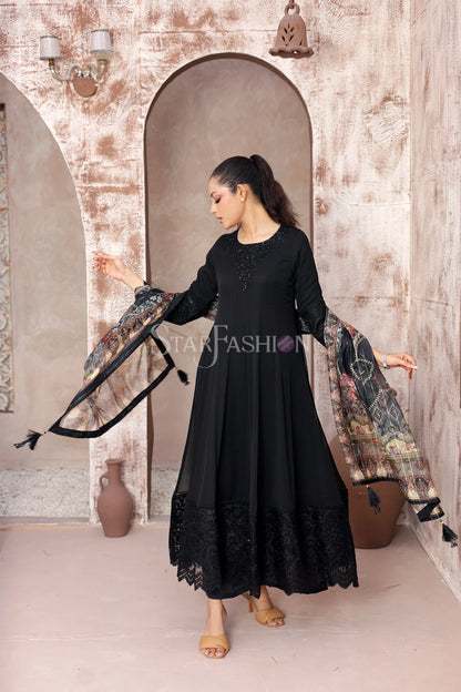 Command attention with Star Fashion’s embroidered black A‑line chiffon kurta ensemble, a 3‑piece stitched suit that blends timeless elegance with modern sophistication.