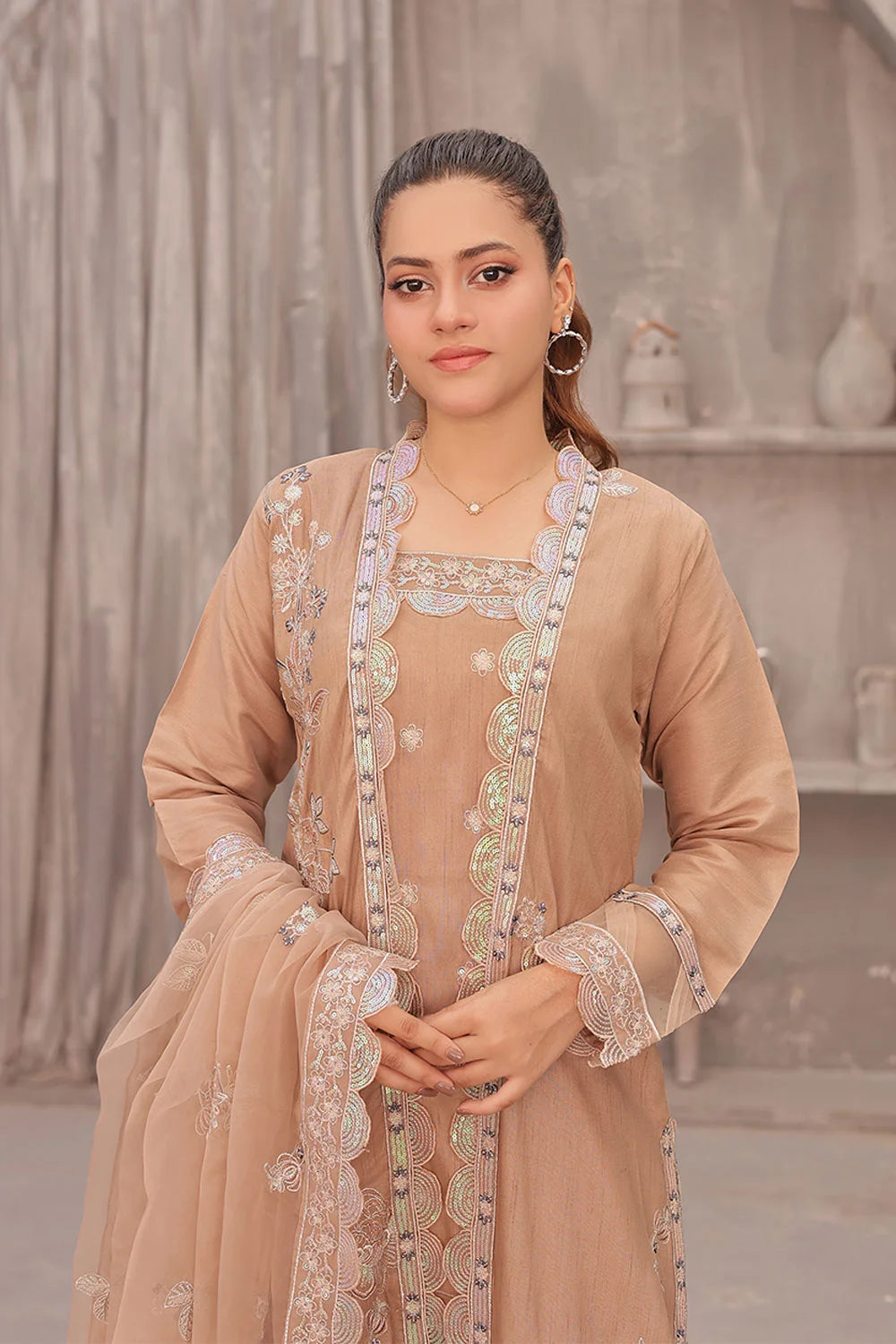 "Coral pink raw silk tunic, embroidered organza overcoat, wide‑leg trousers, and organza dupatta – premium stitched pret wear ensemble"
