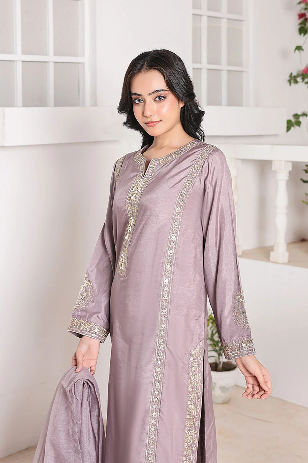 "Intricate embroidery details on lilac raw silk kurta – designer outfit"

