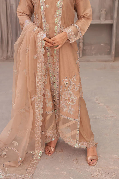 "Coral pink raw silk tunic, embroidered organza overcoat, wide‑leg trousers, and organza dupatta – premium stitched pret wear ensemble"
