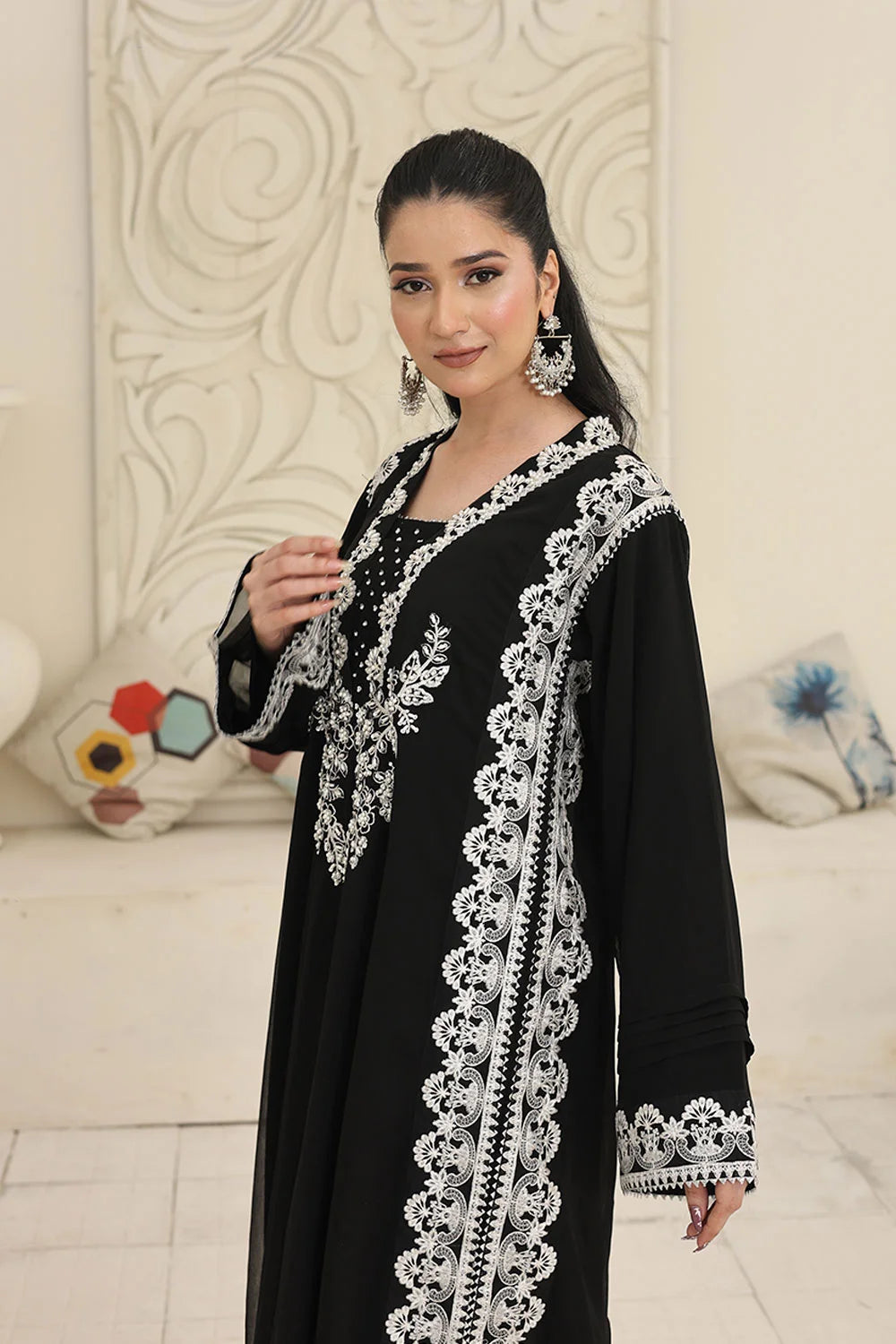 "Embroidered black chiffon kaftan with straight‑fit trousers and khaddi net dupatta – festive outfit"