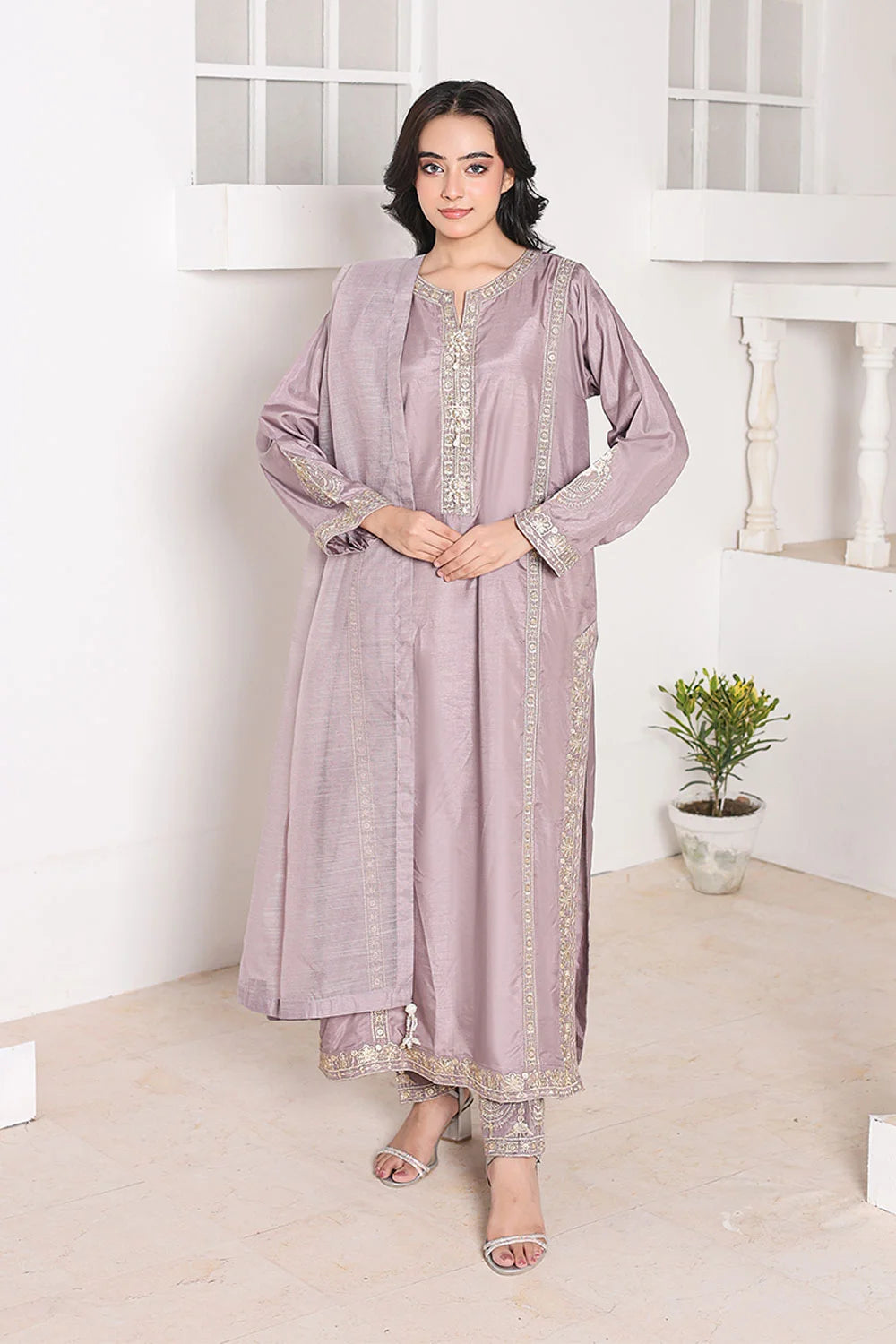"Discover luxury with our Lilac Raw Silk Kurta. Embroidered straight kurta paired with khaddi net dupatta for sophisticated party wear"