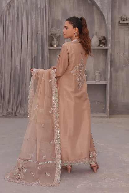 "Elegant coral pink raw silk tunic and wide‑leg trouser styled with embroidered organza dupatta"