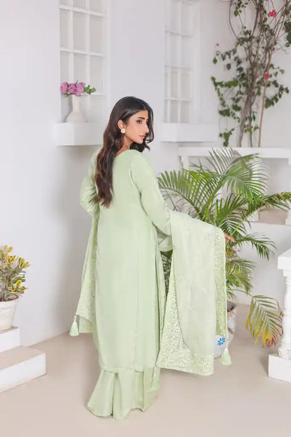 "Designer pistachio embroidered stitched suit with raw silk shirt and khaddi dupatta – perfect for festive wear"