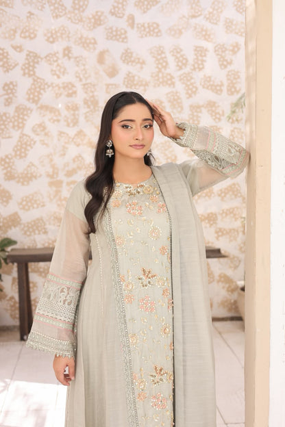 "Sea green 3-piece stitched embroidered suit with khaddi shirt, Russian silk koti, grip shalwar, and khaddi dupatta"