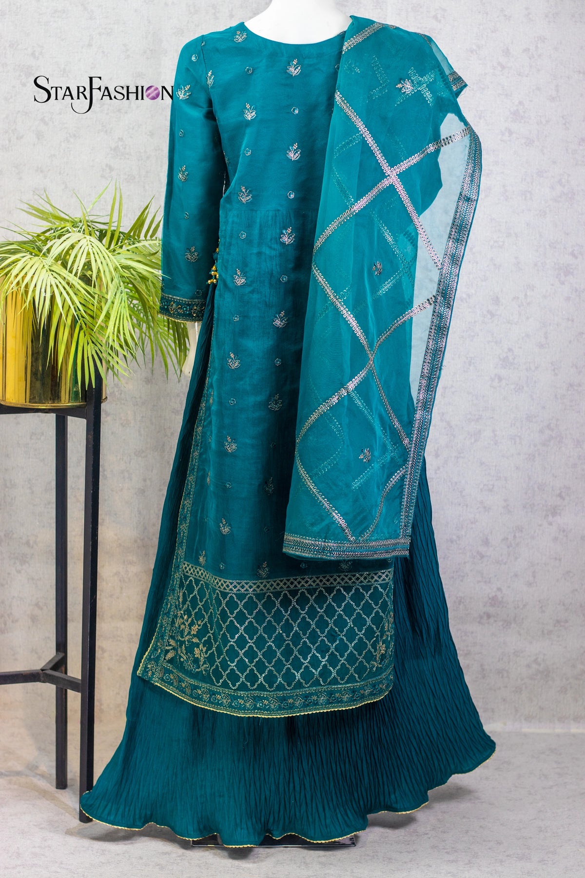 Teal embroidered traditional outfit with a matching dupatta on a neutral background, branded 'StarFashion'.