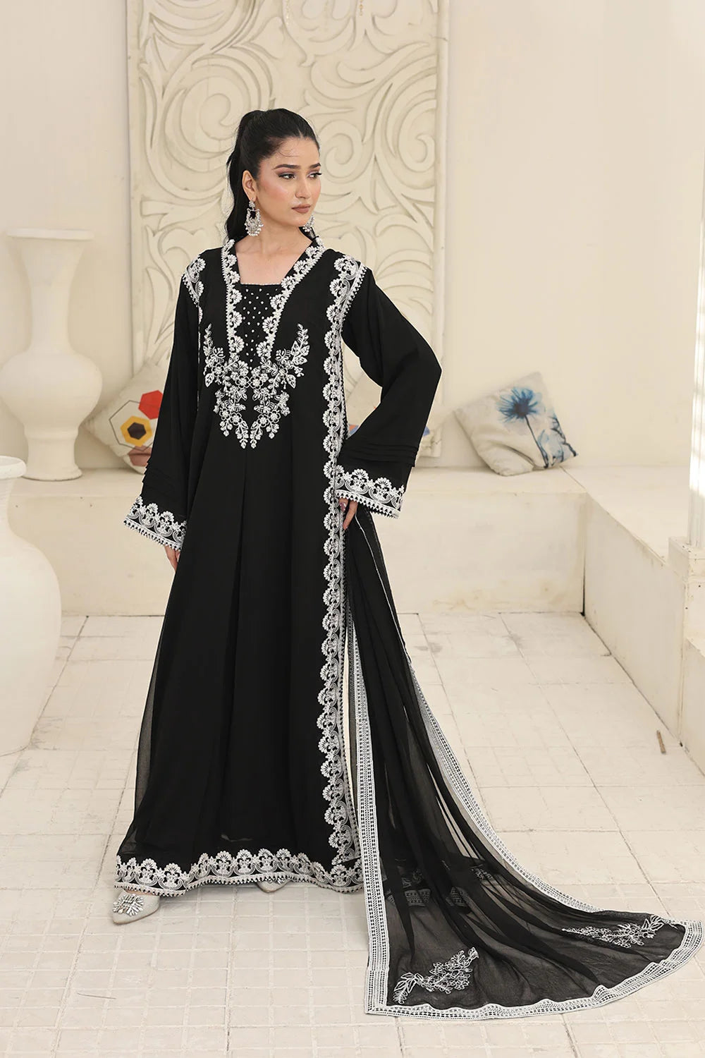 "White embroidery details on black chiffon kaftan – luxury evening wear"