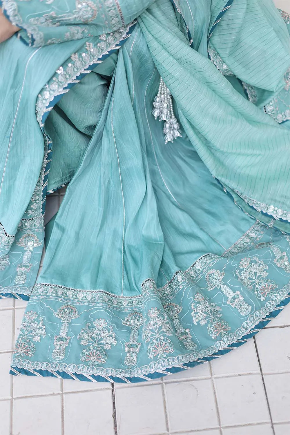 Aqua embroidered 3-piece Pakistani suit featuring a Shamus silk Angrakha frock with full lining, matching Shamus silk palazzo, and self Khaddi dupatta