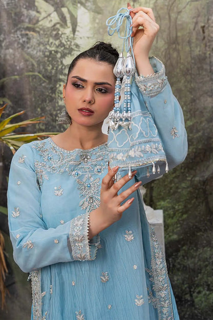 Baby blue embroidered 4-piece Pakistani suit featuring a silver-embellished organza coat, grip shirt and trousers, a soft Malai inner, and a matching organza dupatta