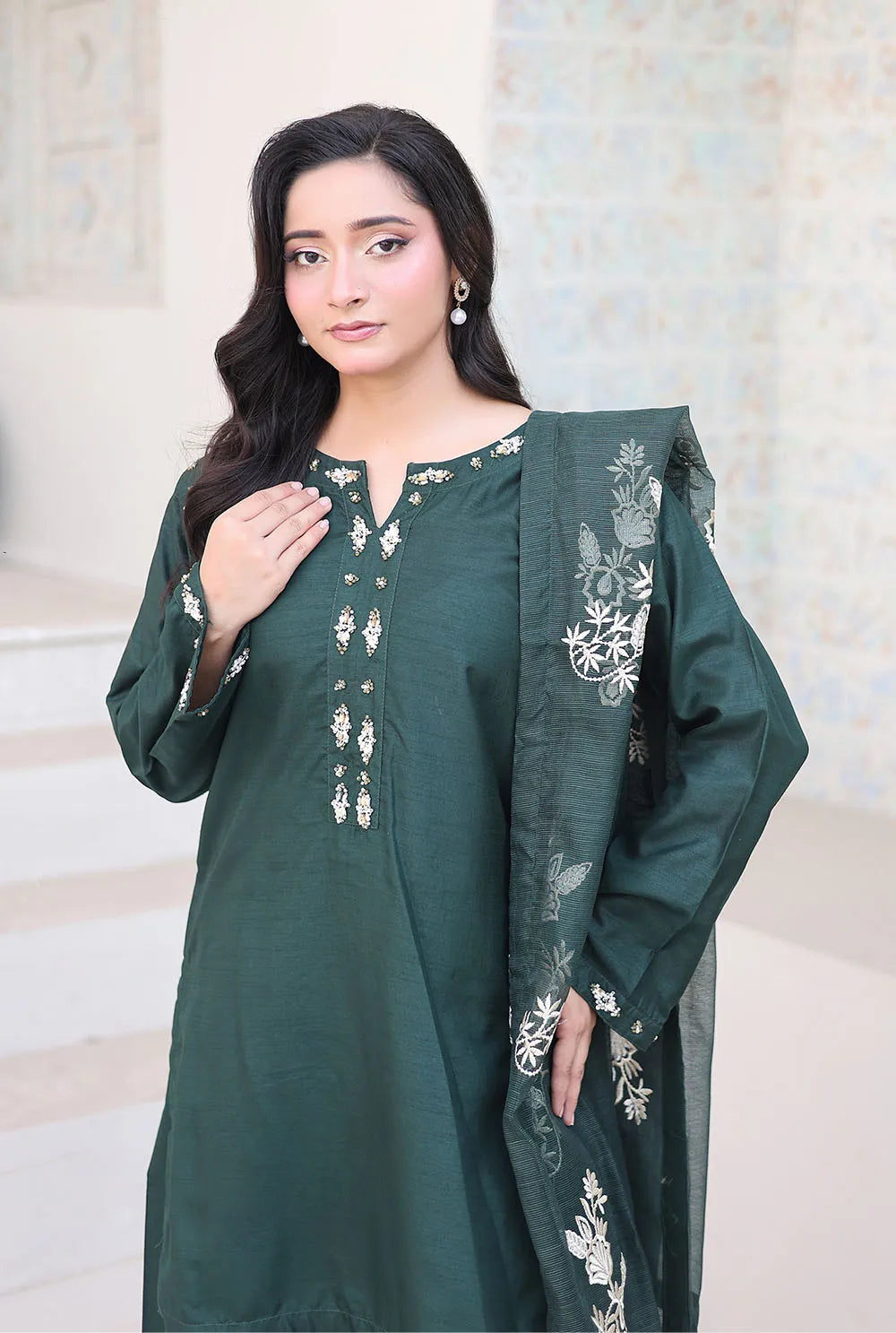 Bottle green embroidered 3-piece Pakistani suit featuring a short Russian silk shirt with full lining, matching Russian silk palazzo trousers, and a Khaddi Net dupatta.