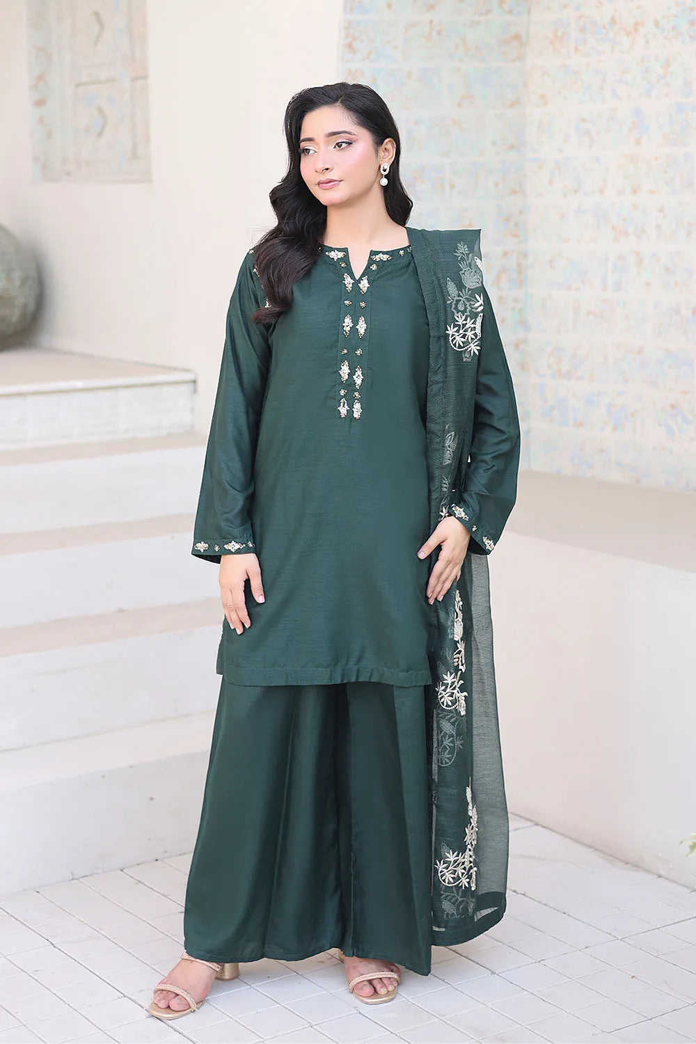 Bottle green embroidered 3-piece Pakistani suit featuring a short Russian silk shirt with full lining, matching Russian silk palazzo trousers, and a Khaddi Net dupatta.