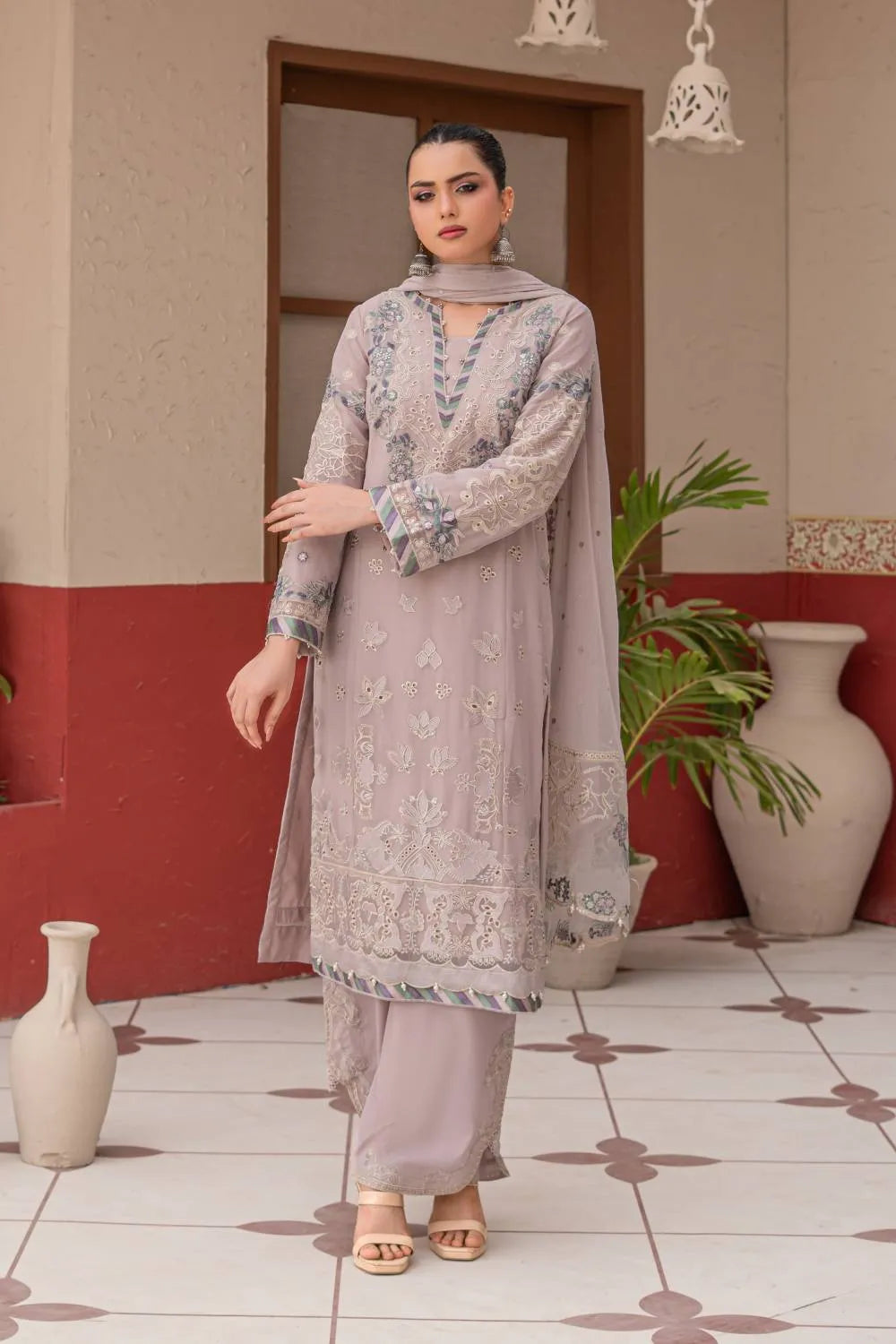 Dusty mauve embroidered 3-piece Pakistani suit featuring a straight-cut chiffon kurta with full lining, Grip palazzo trousers, and a chiffon dupatta.