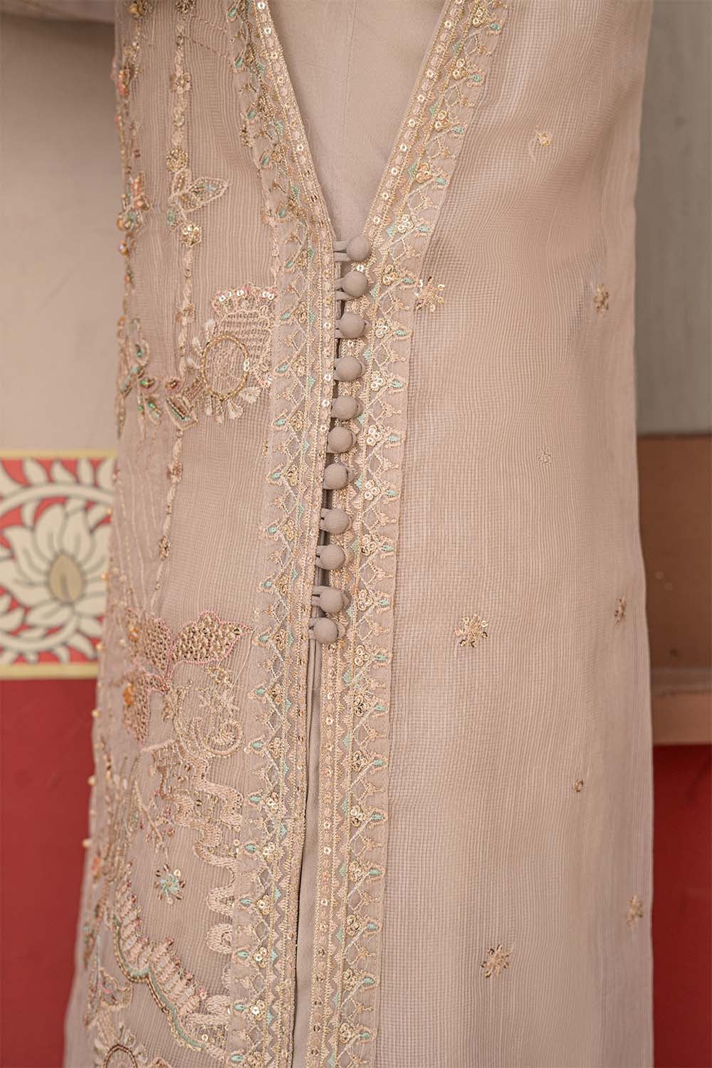 Fawn beige embroidered 4-piece Pakistani suit featuring a Khadi Net coat, Grip inner, matching Grip trousers, and embroidered Khadi Net dupatta