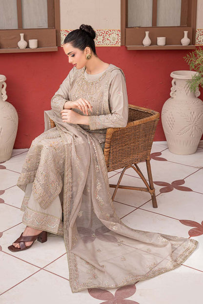 Fawn beige embroidered 4-piece Pakistani suit featuring a Khadi Net coat, Grip inner, matching Grip trousers, and embroidered Khadi Net dupatta