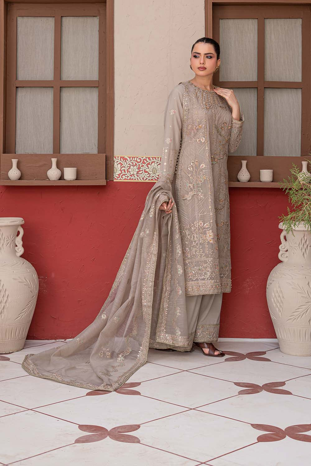 Fawn beige embroidered 4-piece Pakistani suit featuring a Khadi Net coat, Grip inner, matching Grip trousers, and embroidered Khadi Net dupatta