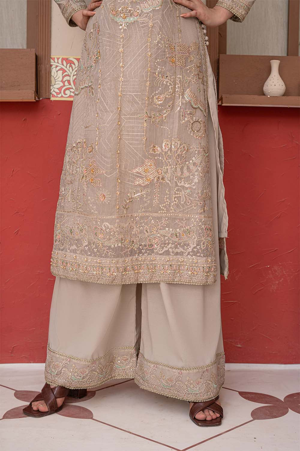 Fawn beige embroidered 4-piece Pakistani suit featuring a Khadi Net coat, Grip inner, matching Grip trousers, and embroidered Khadi Net dupatta