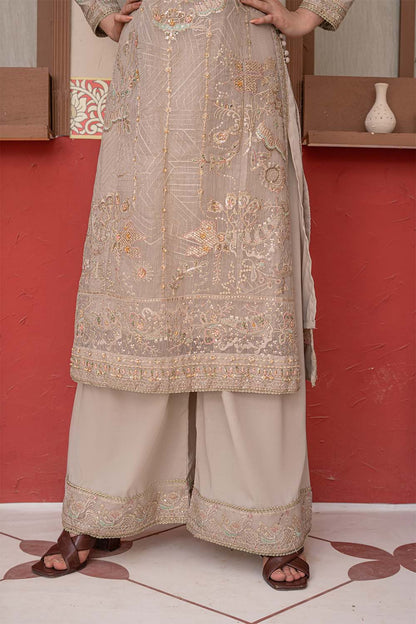 Fawn beige embroidered 4-piece Pakistani suit featuring a Khadi Net coat, Grip inner, matching Grip trousers, and embroidered Khadi Net dupatta