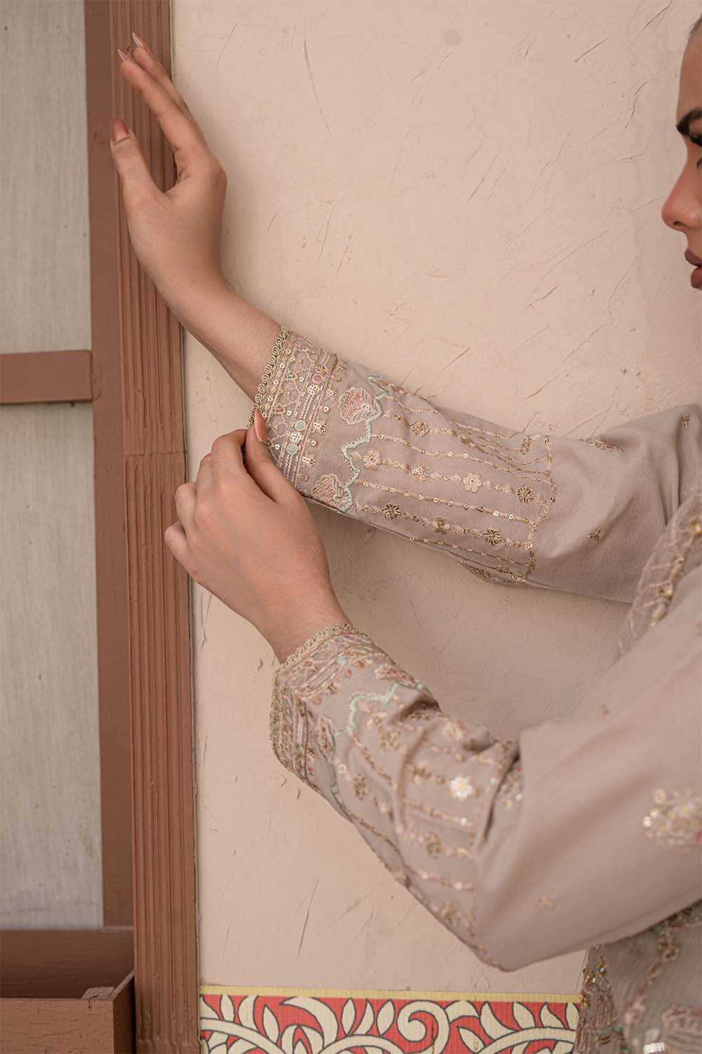 Fawn beige embroidered 4-piece Pakistani suit featuring a Khadi Net coat, Grip inner, matching Grip trousers, and embroidered Khadi Net dupatta