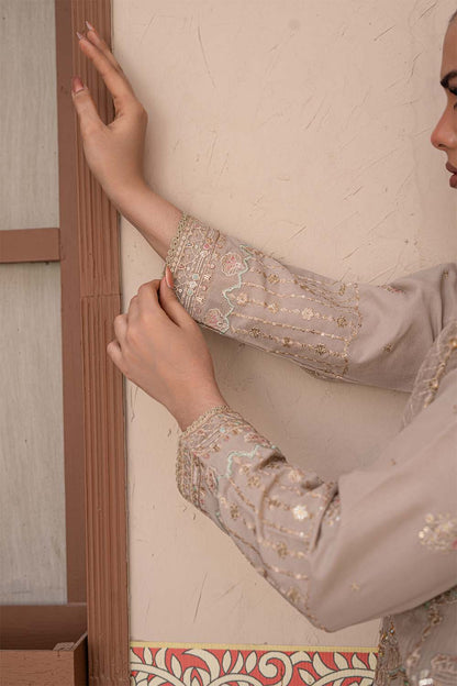 Fawn beige embroidered 4-piece Pakistani suit featuring a Khadi Net coat, Grip inner, matching Grip trousers, and embroidered Khadi Net dupatta