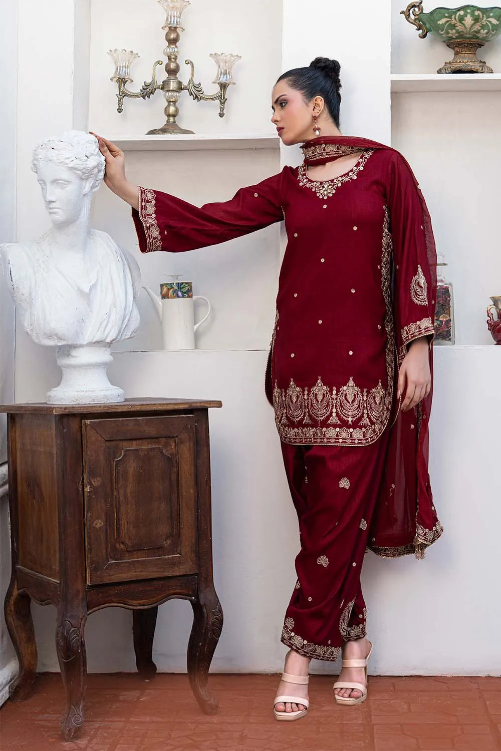 Embroidered 3-piece Pakistani suit with a short raw silk kurta, full Malai lining, matching raw silk shalwar, and chiffon dupatta, available in Blood Red, Lilac, Bottle Green, and Rust