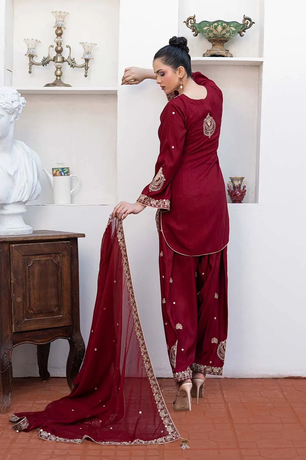 Embroidered 3-piece Pakistani suit with a short raw silk kurta, full Malai lining, matching raw silk shalwar, and chiffon dupatta, available in Blood Red, Lilac, Bottle Green, and Rust