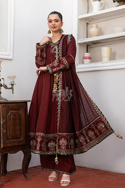 Maroon embroidered 3-piece Pakistani suit featuring a Shamus silk Angrakha frock with full Malai lining, matching Shamus silk palazzo trousers, and a self-Khaddi dupatta