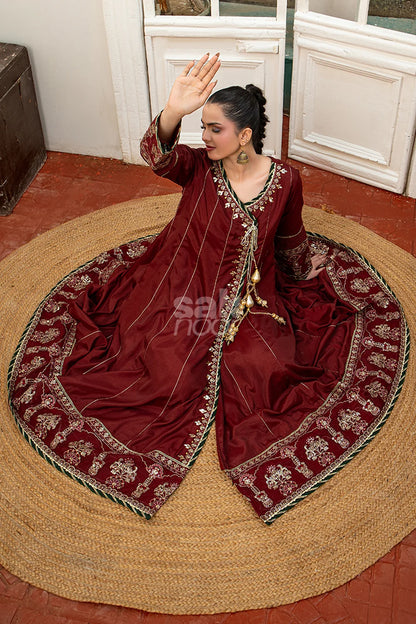 Maroon embroidered 3-piece Pakistani suit featuring a Shamus silk Angrakha frock with full Malai lining, matching Shamus silk palazzo trousers, and a self-Khaddi dupatta