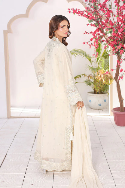 Off-white embroidered 3-piece Pakistani suit featuring a long chiffon kaftan with full lining, straight Grip trousers, and a matching chiffon dupatta.