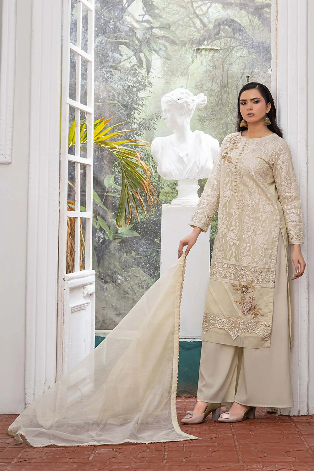 Off-white embroidered 3-piece Pakistani suit featuring a straight-cut organza kurta with full lining, Grip palazzo trousers, and a Khaddi Net dupatta.