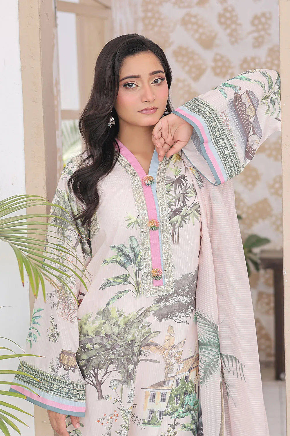 Off-white 3-piece Pakistani suit featuring a long Bana Dora kaftan, matching straight Bana Dora trousers, and a printed Khaddi Net dupatta.