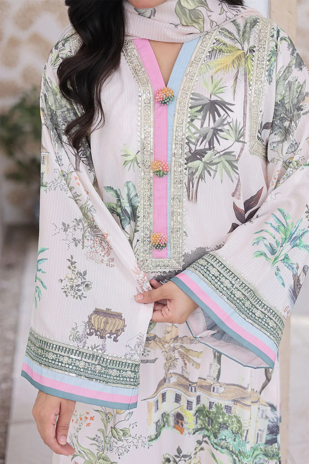 Off-white 3-piece Pakistani suit featuring a long Bana Dora kaftan, matching straight Bana Dora trousers, and a printed Khaddi Net dupatta.
