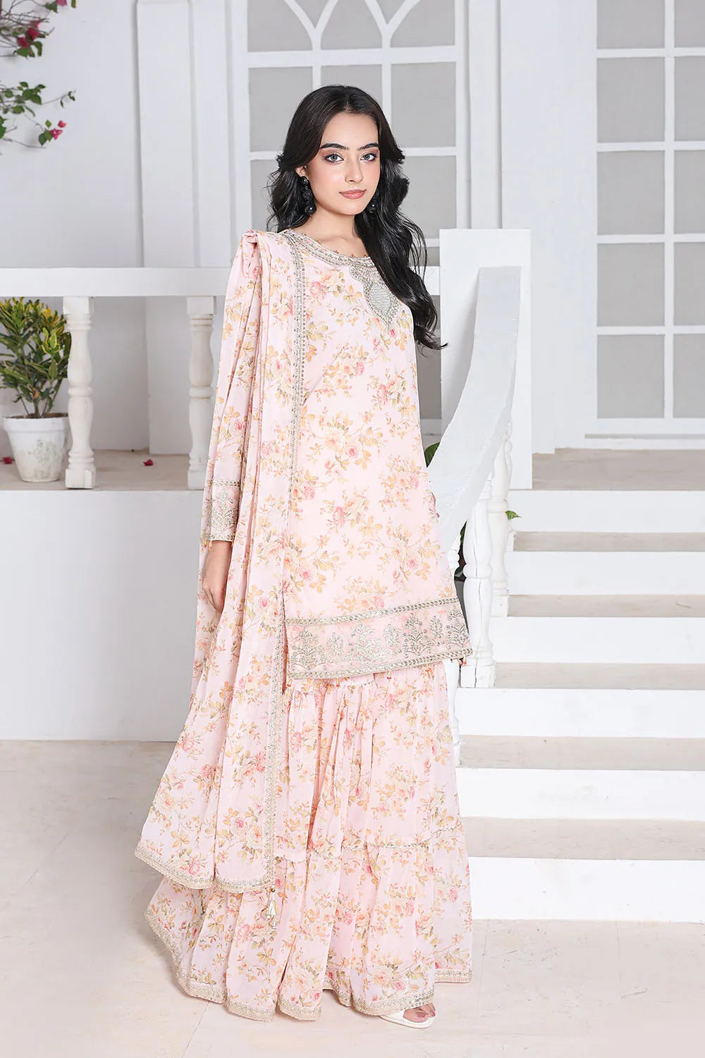 Peach embroidered 3-piece Pakistani suit featuring a printed chiffon short shirt with full lining, straight-leg printed chiffon gharara with attached lining, and matching printed chiffon dupatta.