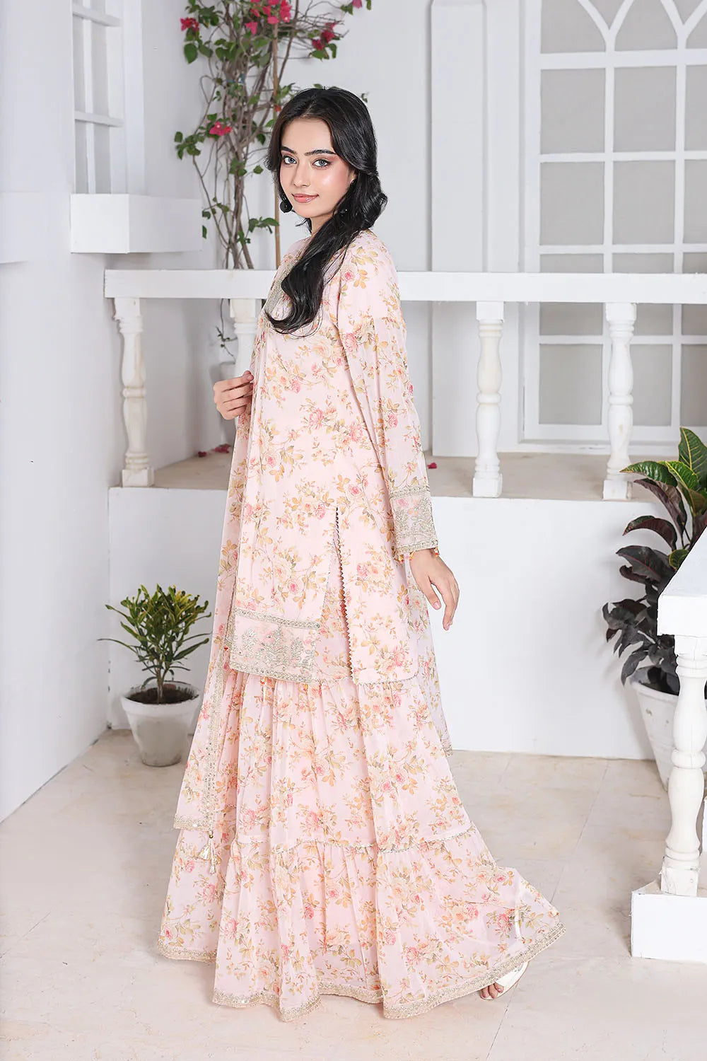 Peach embroidered 3-piece Pakistani suit featuring a printed chiffon short shirt with full lining, straight-leg printed chiffon gharara with attached lining, and matching printed chiffon dupatta.