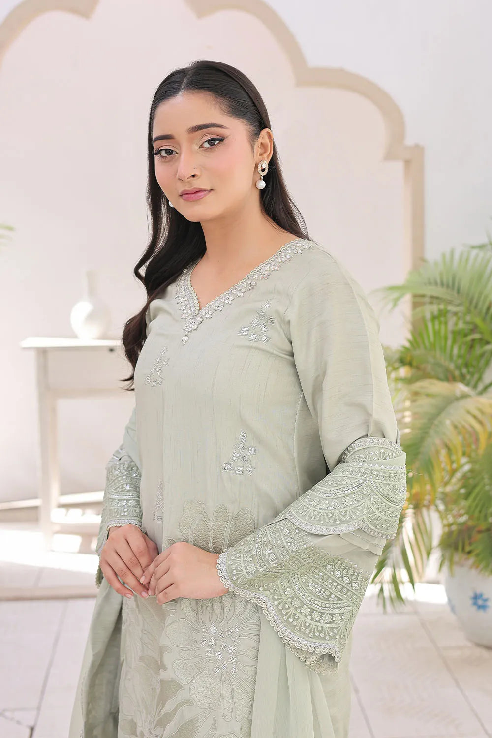 Pista embroidered 3-piece Pakistani suit featuring a straight-cut raw silk kurta with full lining, matching raw silk palazzo trousers, and a chiffon dupatta.