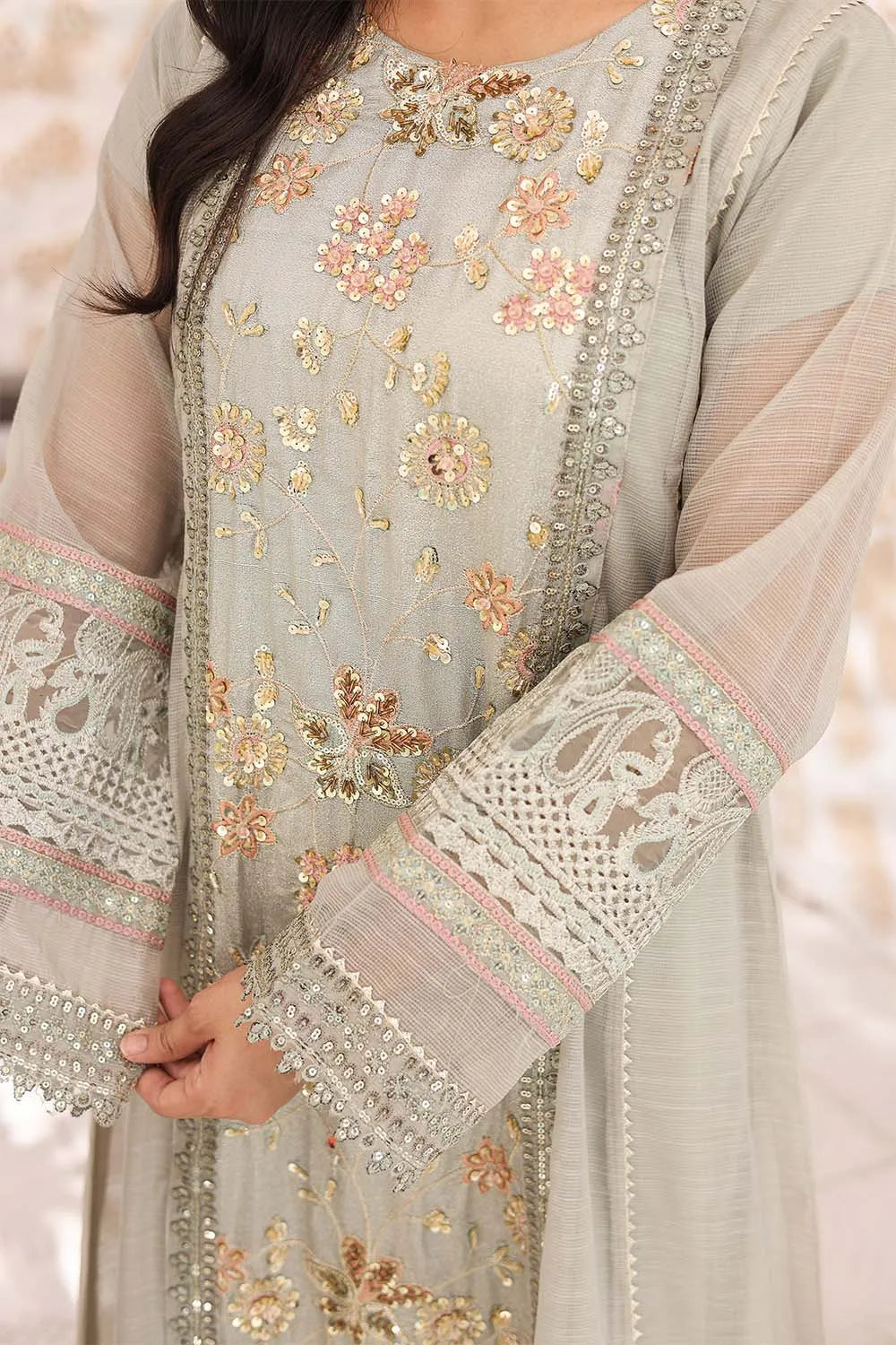 Pistachio three-piece embroidered frock featuring Khaddi Net fabric, full lining, Crepe straight trousers, and a matching Khaddi Net dupatta.