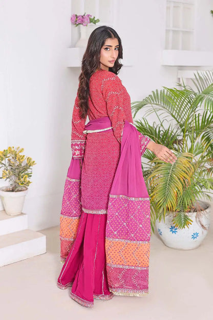Shocking Pink three-piece women's suit featuring a Bandhani Chunri print short chiffon kurti with keyhole neckline, wide-flared crepe palazzo trousers, and chiffon dupatta with patchwork pallu.