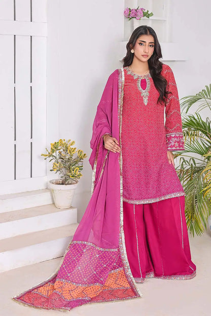 Shocking Pink three-piece women's suit featuring a Bandhani Chunri print short chiffon kurti with keyhole neckline, wide-flared crepe palazzo trousers, and chiffon dupatta with patchwork pallu.