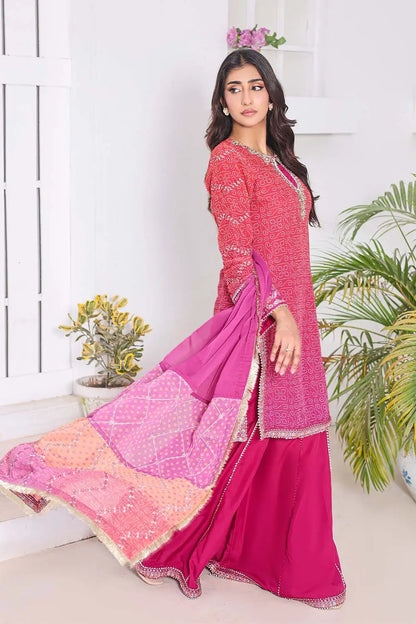 Shocking Pink three-piece women's suit featuring a Bandhani Chunri print short chiffon kurti with keyhole neckline, wide-flared crepe palazzo trousers, and chiffon dupatta with patchwork pallu.