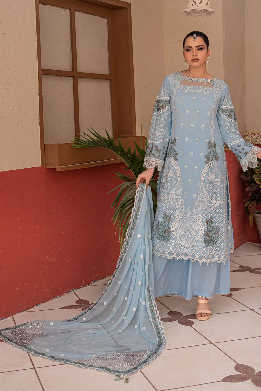 Sky blue embroidered 3-piece Pakistani suit featuring a straight-cut chiffon kurta with full lining, crepe palazzo trousers, and a matching chiffon dupatta.