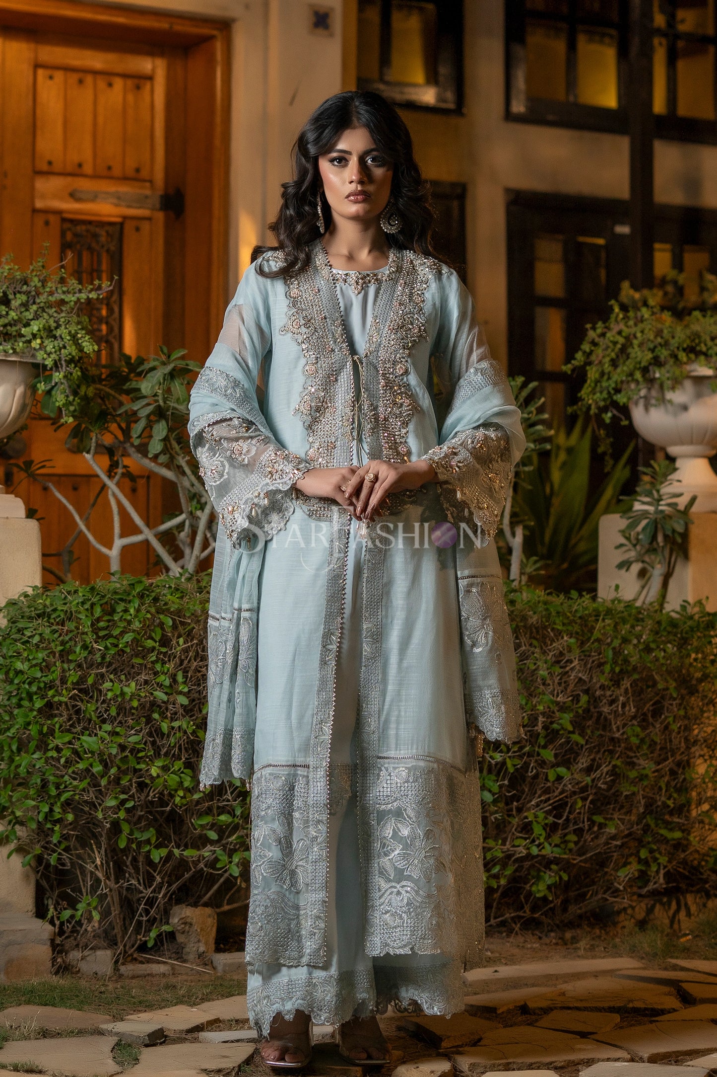 Sky blue khaddi net coat-style embroidered suit front view – SF-2426.