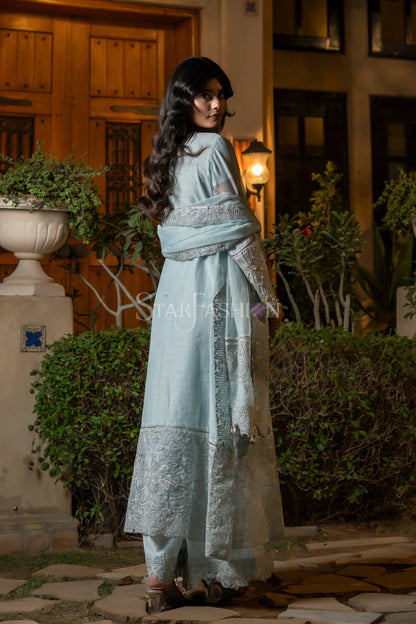 Side view of sky blue khaddi net coat-style embroidered shirt – SF-2426.