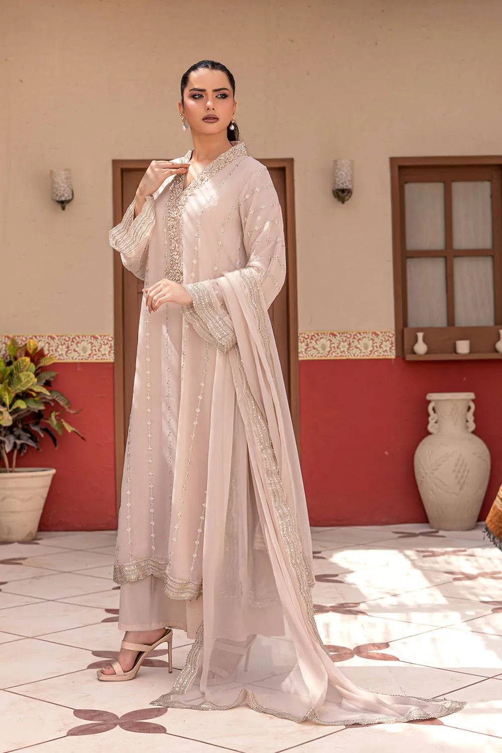 Taupe embroidered 3-piece Pakistani suit featuring a long chiffon kaftan with full lining, crepe palazzo trousers, and a matching chiffon dupatta.
